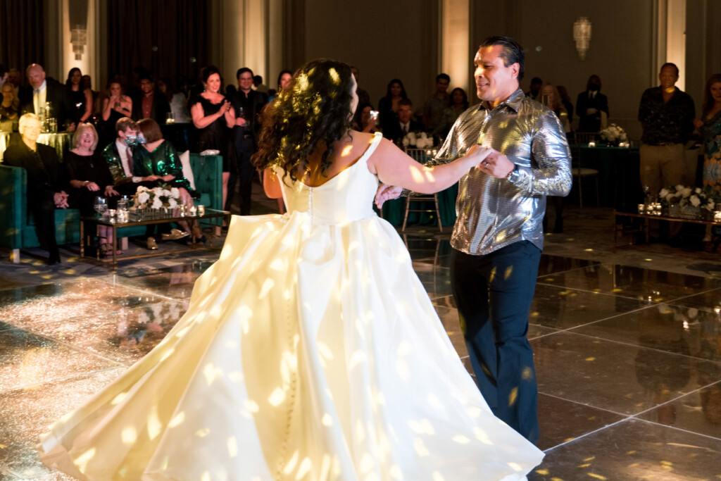 Cara Cruz and Robbie Valach dancing at wedding